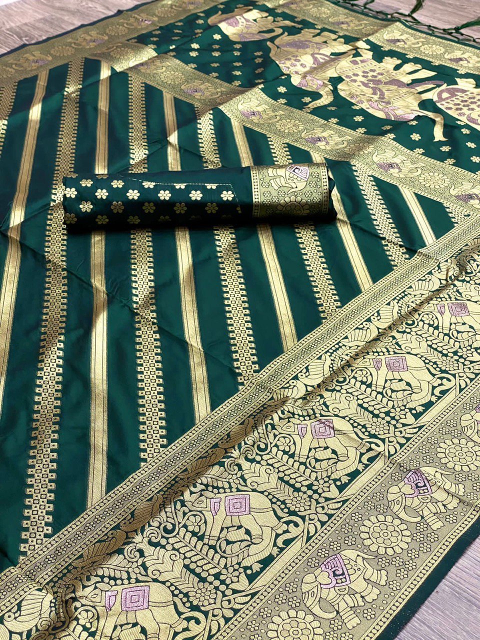 Bottle Green Silk Saree With Zari Weaving Work.