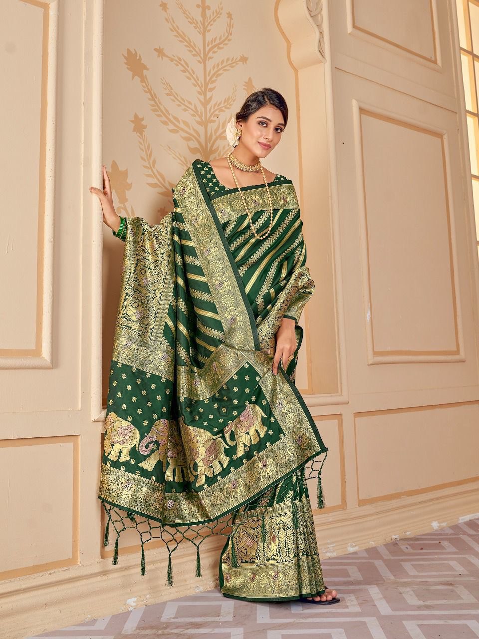 Bottle Green Silk Saree With Zari Weaving Work.