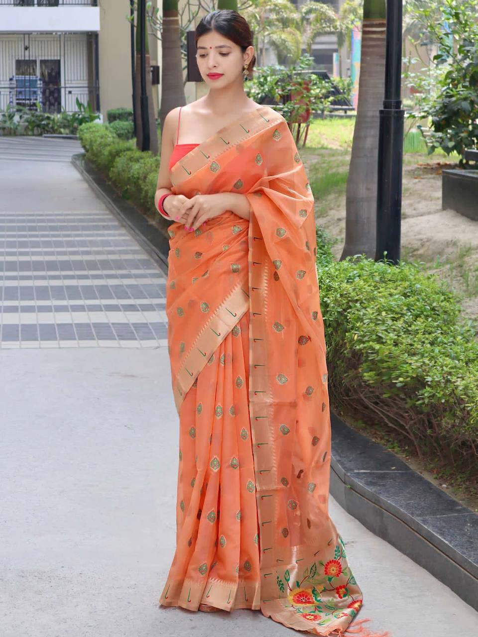 Orange Paithani Saree With Zari Weaving Border.