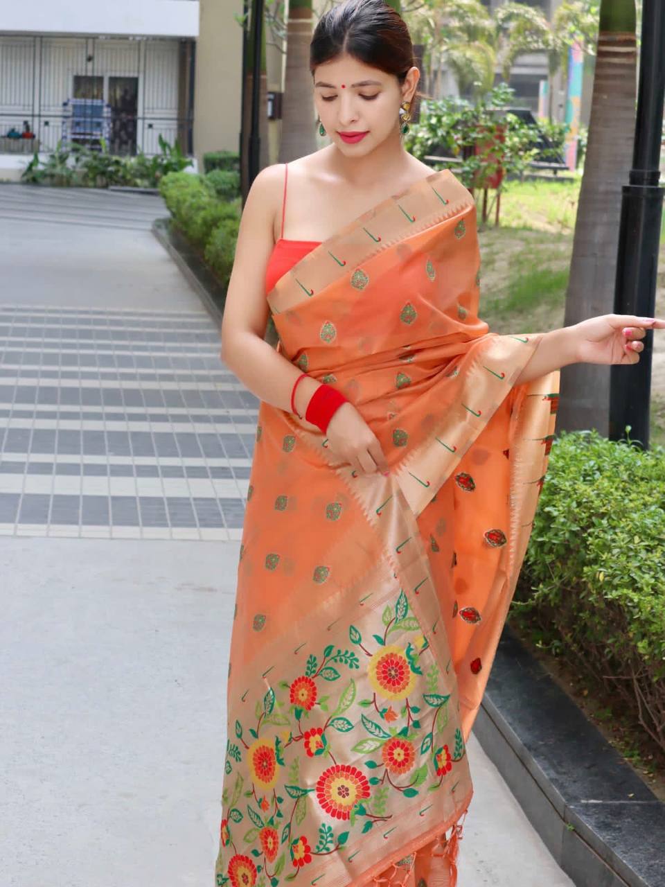 Orange Paithani Saree With Zari Weaving Border.